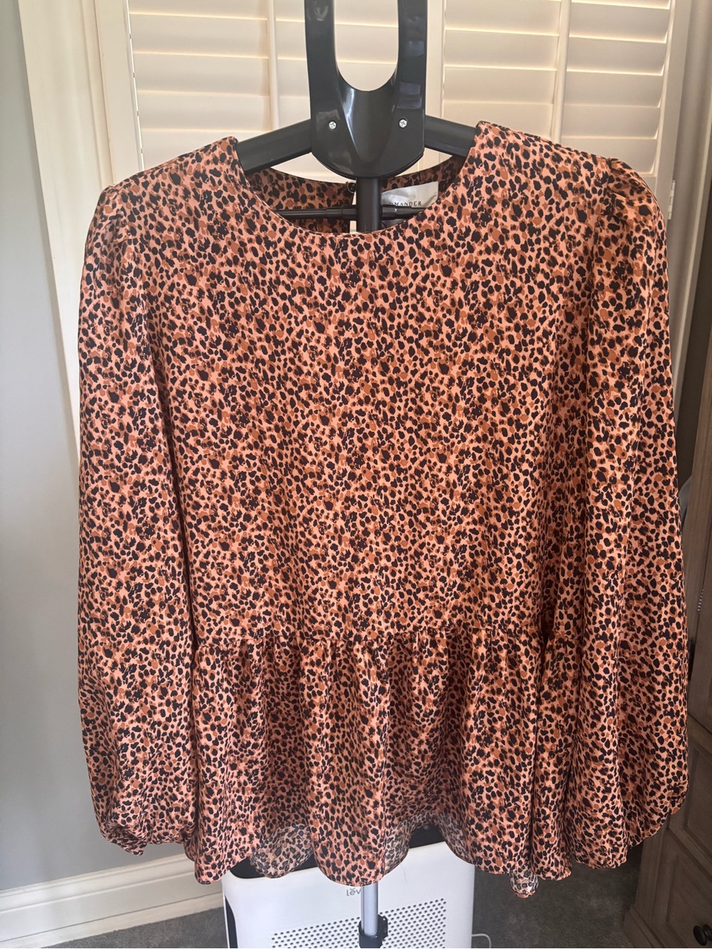 Pomander Place Leopard-Print Peplum Blouse